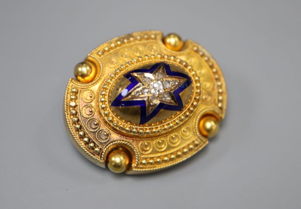 A Victorian yellow metal, blue enamel and diamond set oval mourning brooch,